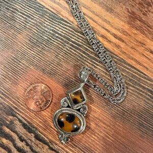 Elegant Silver and Brown Pendant Necklace